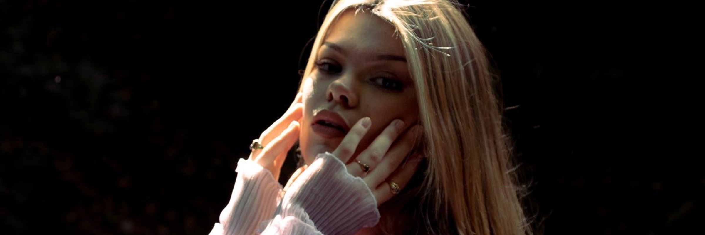 Image of Keara the female lead singer of She's Mine posing for camera