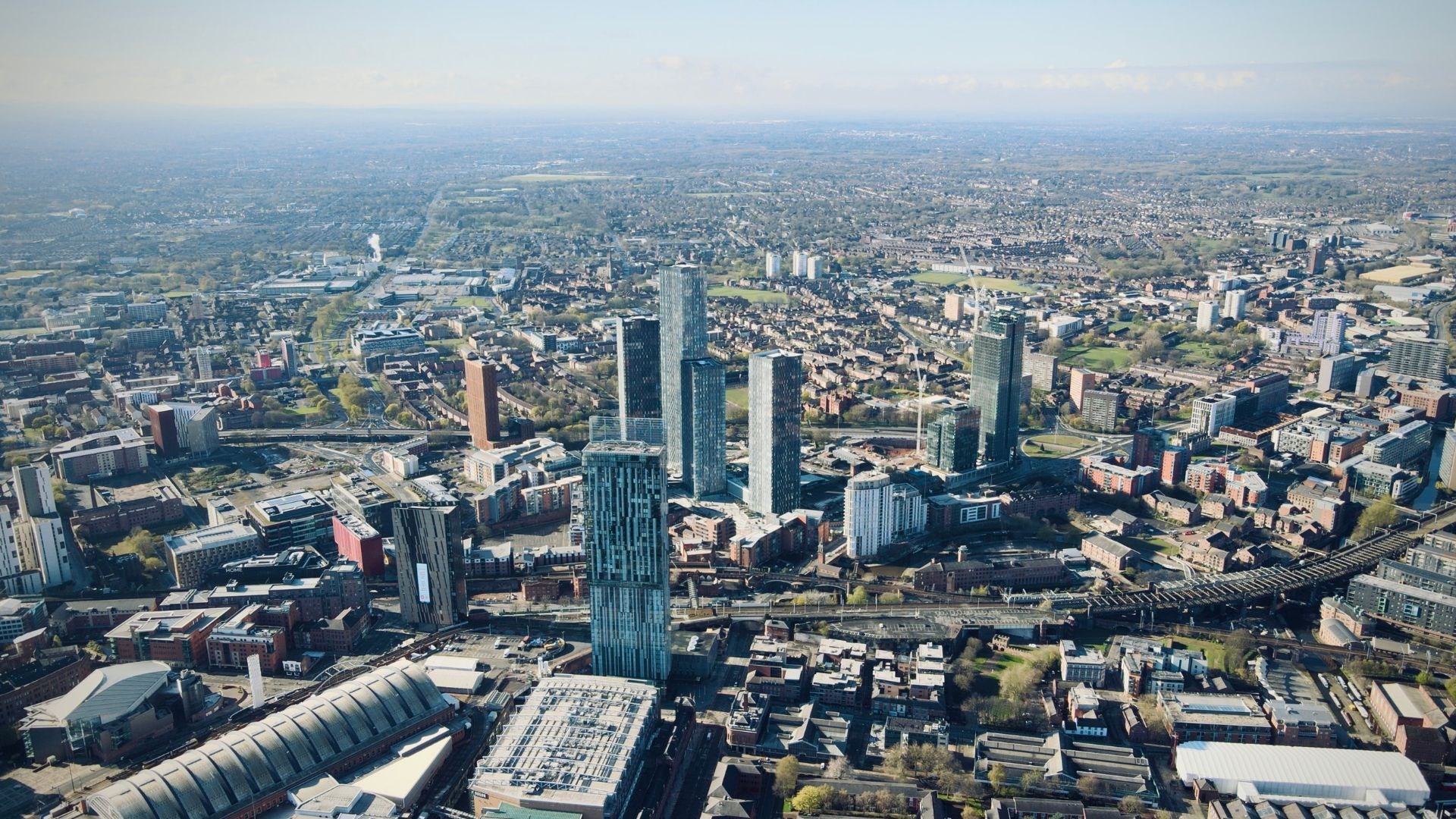 an aerial view of the city of Manchester