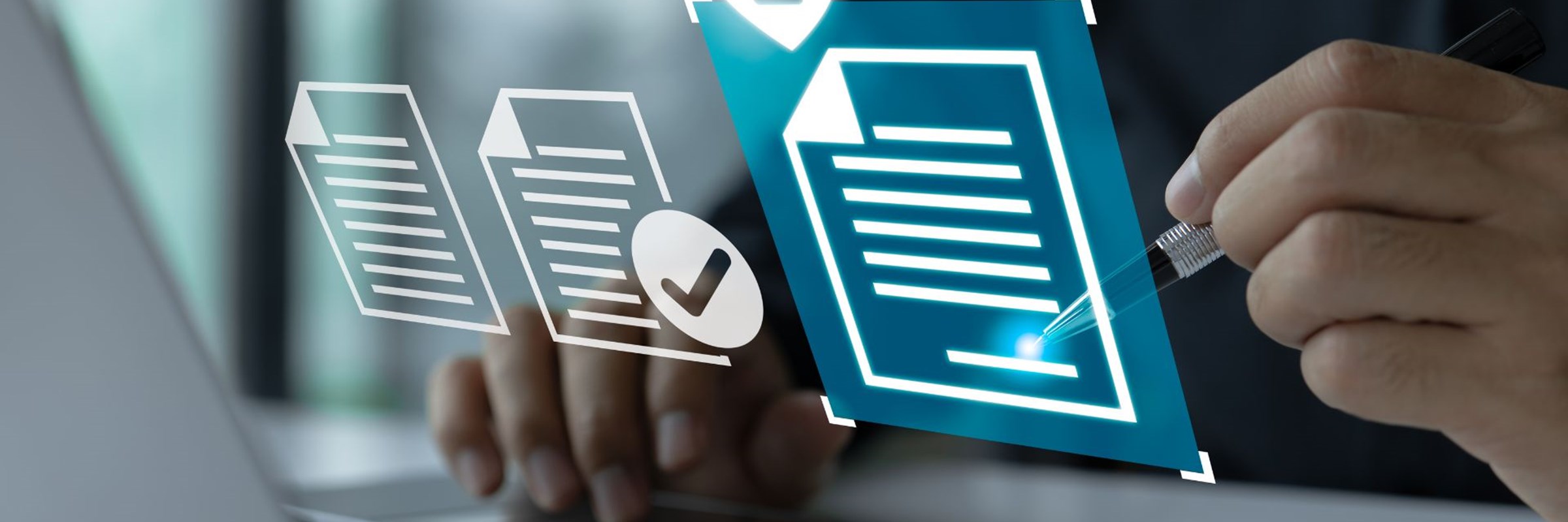 businessman working on laptop with document icons on screen