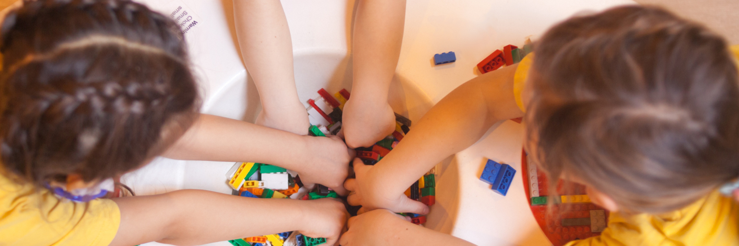 children playing with lego