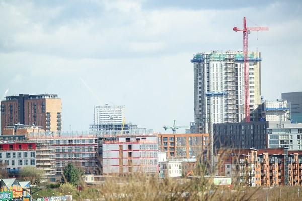 Large city buildings being constructed