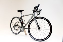 A refurbished hybrid bike on a white backdrop