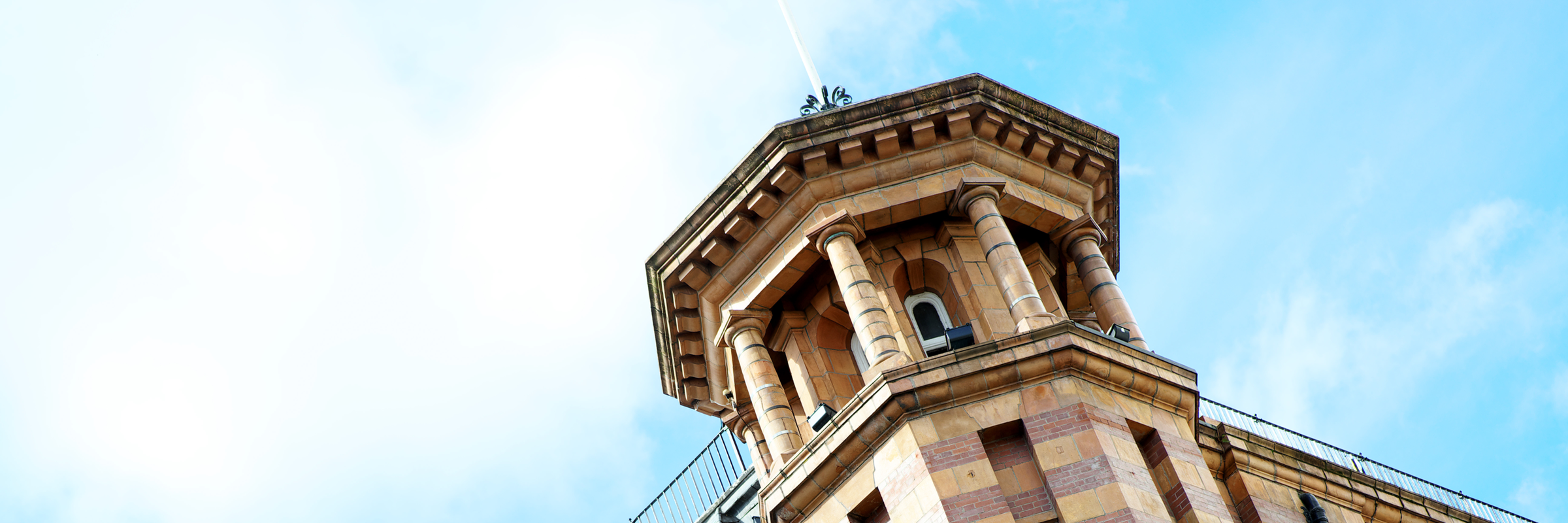 Tootal buildings - turret against bright blue sky