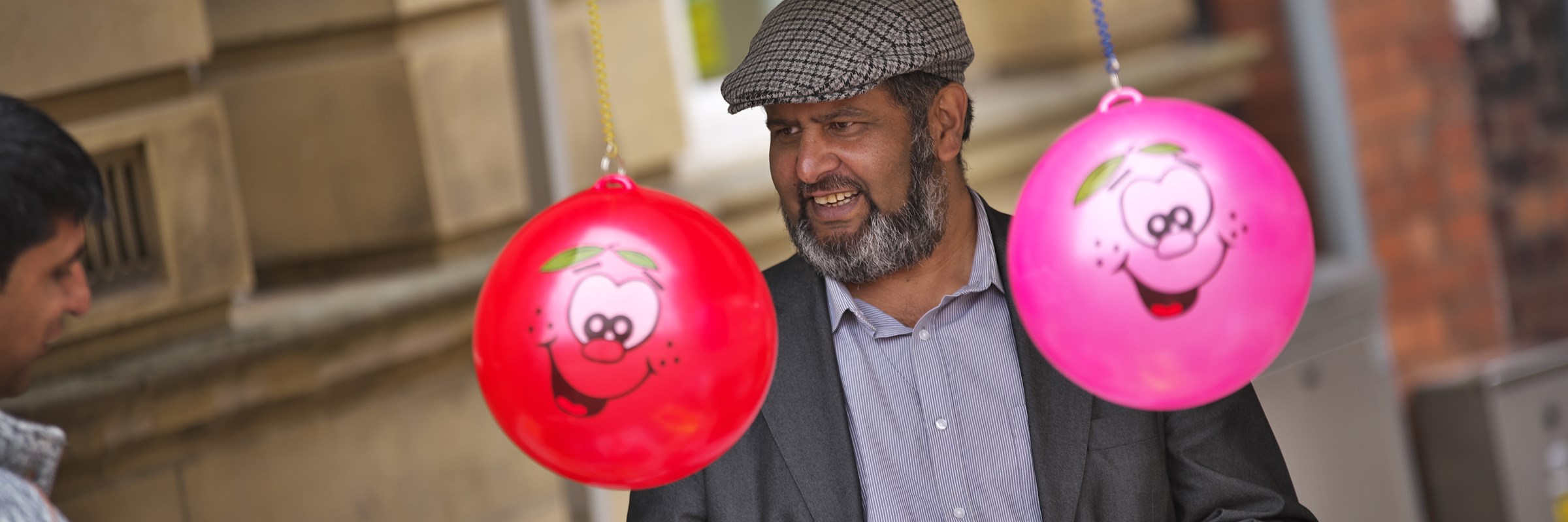 Two men at a market stall in Rochdale