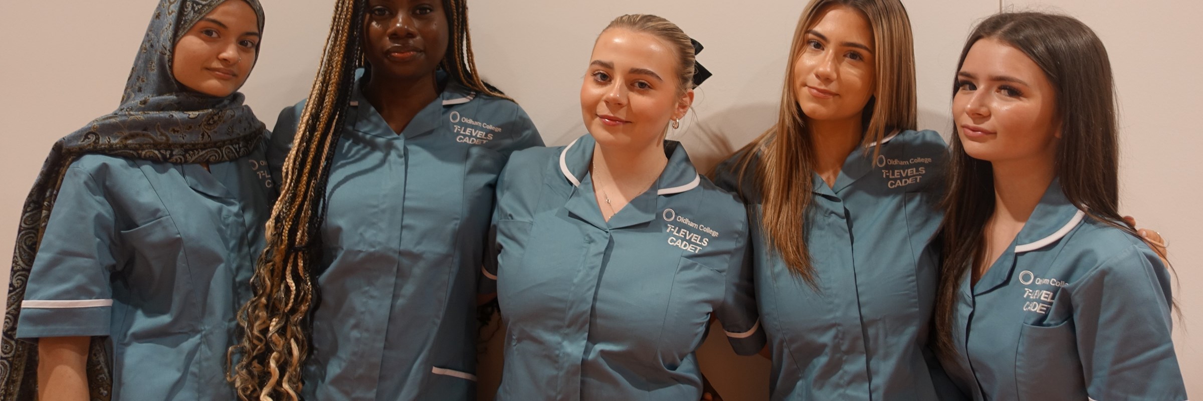 This image shows five people dressed in uniforms and was taken in a non-clinical setting for illustrative purposes